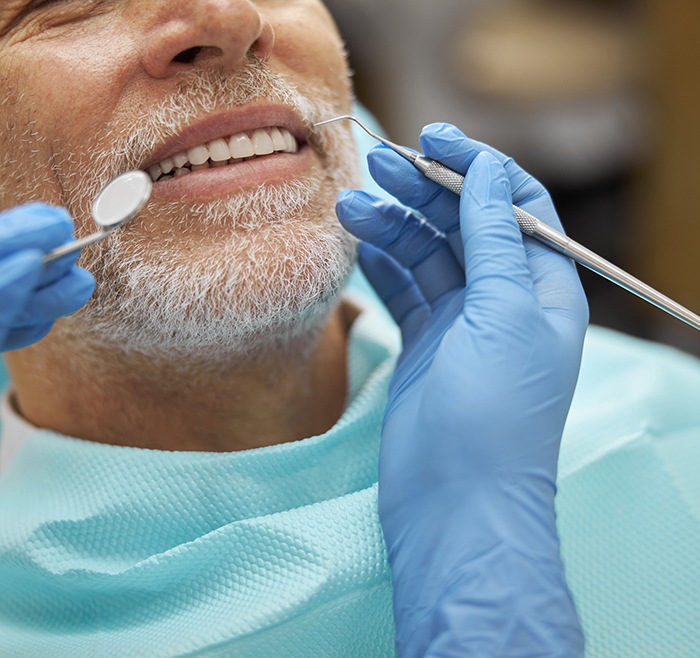 Man preparing to have his teeth cleaned